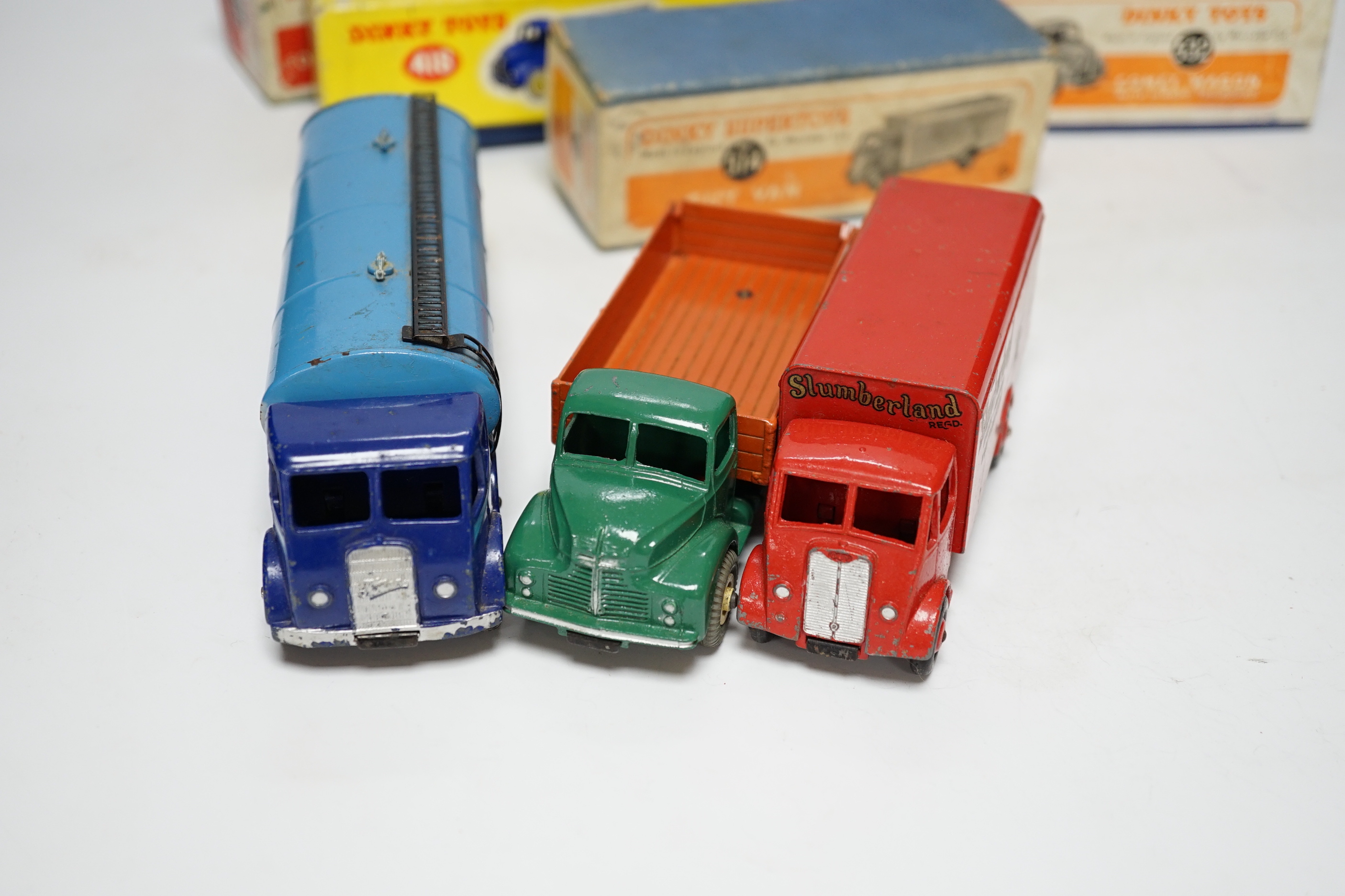 Three boxed Dinky Supertoys; (514) a Guy Slumberland Van, (504) a Foden 14 ton Tanker, and a (532) Comet Wagon with hinged tailboard, together with two useful empty boxes for a second Comet Wagon (418) and a Guy 4 ton Lo